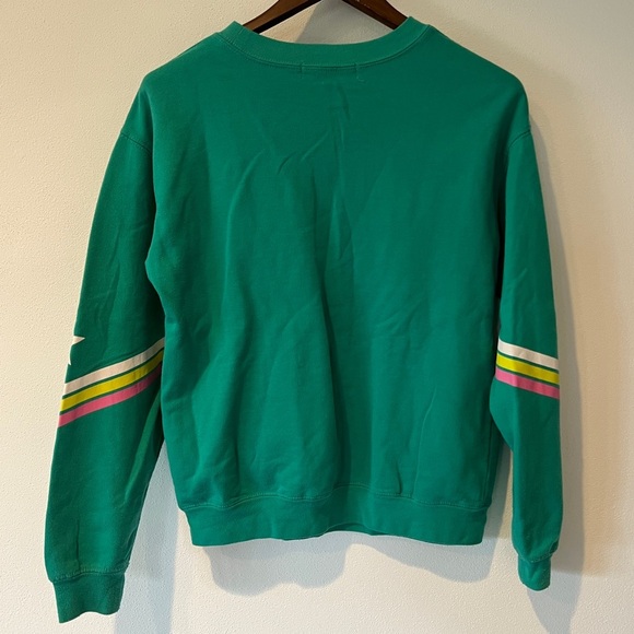 Wound Up Kindness is Universal Star Elbow Graphic Crew Neck Sweatshirt - Picture 7 of 7